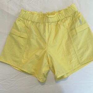 Free people movement yellow shorts